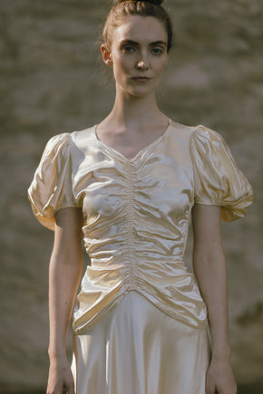 C. 1940s cream puff sleeve wedding gown