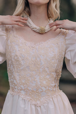 Vintage puff sleeve lace wedding gown