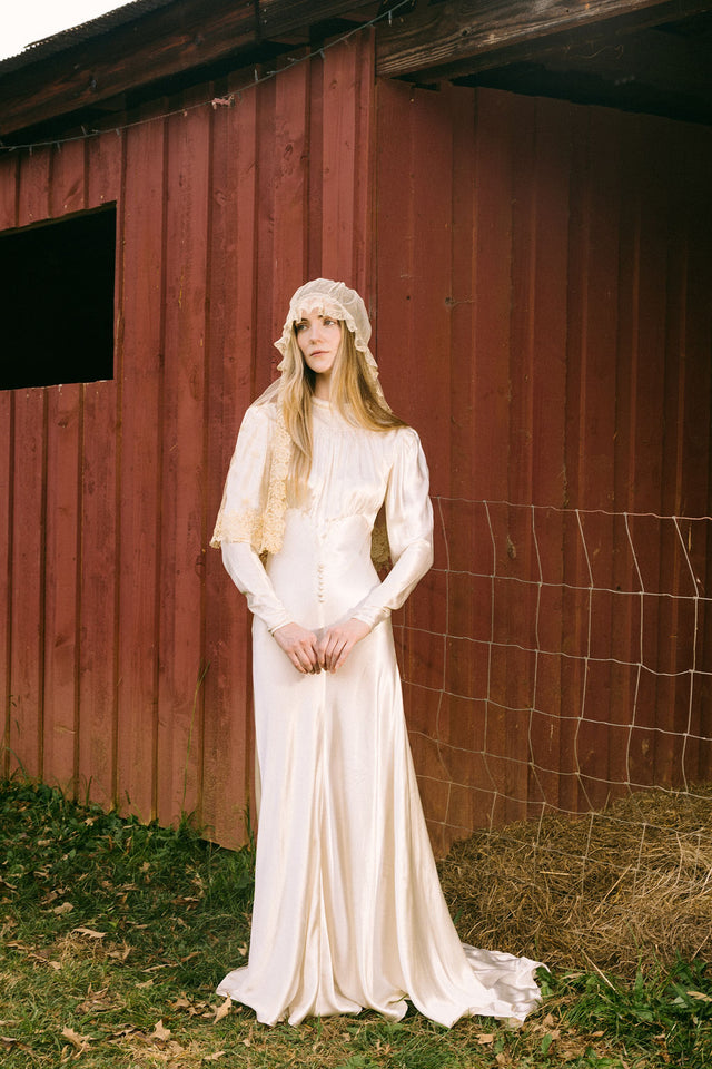 1930s silk satin smocked wedding gown, England