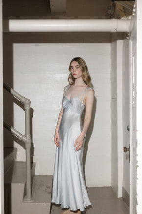 1930s French blue silk scalloped bow gown, France