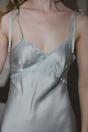 1930s French blue silk scalloped bow gown, France