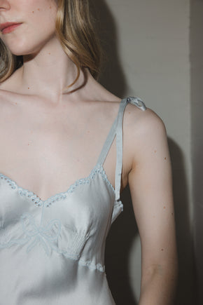 1930s French blue silk scalloped bow gown, France