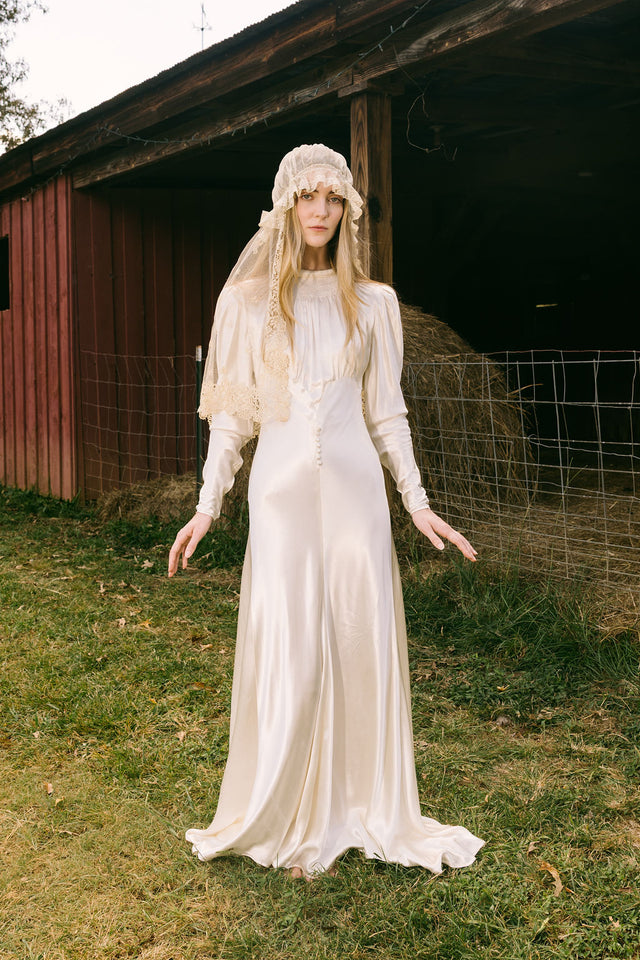 1930s silk satin smocked wedding gown, England